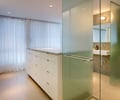 Preview of Open House - Image 18: Door, Sliding Door, master bath, tab pulls, curtain, concrete floor, shower, etch matte glass, vanity.