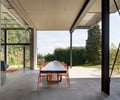 Preview of Open House - Image 6: Chair, Canopy, exterior eating, concrete, table, structure steel, glass exterior, cement panel.