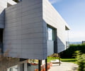 Preview of Open House - Image 7: Building, Dining Table, Furniture, Table, cement panel, structure steel, concrete paver, courtyard.