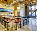 Preview of Payscale - Image 2: historic, Bar Stool, Furniture, Dining Table, Table, Structure wood, Concrete floor, Indoor, Exposed duct, Lighting, Wood ceiling.