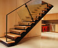 Preview of Petersen Residence - Image 1: Banister, Handrail, Staircase, Furniture, stair, basement, wood panel, raeco , workroom, cabinetry, wood treads, glass infill.