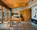 Preview of South Whidbey Residence - Image 11: Dining Table, Furniture, Dining Room, Great room, Interior Design, Kitchen, Wood, Concrete, Glass, Sliding door, Chair, Concrete floor.