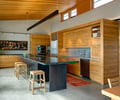 Preview of South Whidbey Residence - Image 14: Furniture, Indoors, Dining Table, Table, Plywood, Wood, Dining Room, Interior Design, Room, Kitchen, Concrete, Bar Stool, Stool, Bar, Cabinet, Sliding door, lighting.