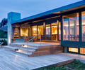 Preview of South Whidbey Residence - Image 2: Deck, Wood, Hard Wood, Waterfront, Concrete, Grill, Furniture, Patio, Entry, Structure concrete, Sliding door, Dining.