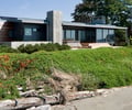 Preview of South Whidbey Residence - Image 3: Outdoors, Yard, Building, House, Glass, Concrete, Wood, Waterfront, Structure concrete, outdoor seating, Sliding door.