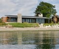 Preview of South Whidbey Residence - Image 5: Waterfront, House, Glass, Wood, Concrete, Yard, Beach, Furniture, Patio.