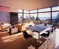 Preview of Stretch House - Image 4: Dining Table, Furniture, Table, Couch, Fireplace, Hearth, Indoors, Interior Design, Meeting Room, Room, Dining room, Exterior glass.