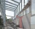 Preview of Tacoma Art Museum Addition - Image 3: stair, glass wall, concrete wall, skylight, modern, urban, industrial, structure steel, interior walkway, natural light, minimalist, contemporary, green building, sustainable, open design, geometric lines.