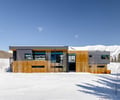 Preview of Sun Valley Fireweed - Image 0: corten, modern architecture, large windows, cantilever, facade design, snow landscape, mountain view, geometric form, flat roof, metal siding, winter setting, contemporary house, minimalistic design.