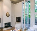 Preview of The Gym - Image 13: pivot door, fireplace, patio, wood floor, Historic.