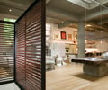 Preview of The Gym - Image 6: Hardwood, Wood, Indoors, Interior Design, Kitchen, Room, screen,  divider, structure concrete, skylight, grating, wood floor, terrazzo, great room, Historic.