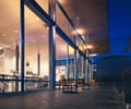Preview of Tobias Residence - Image 17: Steel frame, Terminal, Dining Table, Furniture, Table, Architecture, Building, Convention Center, glass exterior, structure steel.