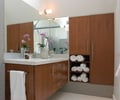 Preview of Torgerson Remodel - Image 5: Towel, Indoors, Interior Design, Kitchen, Room, Flora, Jar, Plant, Potted Plant, Pottery, Vase, Furniture, Cabinet, China Cabinet, bathroom, mirror.