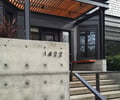 Preview of Victorian Redux - Image 21: Patio, Porch, Jar, Plant, Potted Plant, Bench, Railing, concrete wall, ipe, paver.