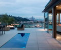 Preview of West Newton Penthouse - Image 0: Chair, Furniture, Apartment, Building, Housing, Indoors, Interior Design, Room, water feature, glass exterior, structure steel, fire, rail, glass rail.