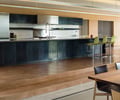 Preview of Windermere Residence - Image 13: Dining Table, Furniture, Table, Indoors, Interior Design, Kitchen, Room, Chair, steel blackened, concrete floor, color, lighting.
