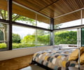 Preview of Windermere Residence - Image 22: Bed, Furniture, Plywood, Wood, wood ceiling, concrete floor, structure steel.