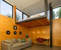 Preview of Windermere Residence - Image 23: Chair, Furniture, Couch, Apartment, Building, Housing, Indoors, Loft, wood wall, concrete floor, wood ceiling, kids.