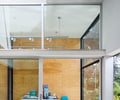 Preview of Windermere Residence - Image 24: Chair, Furniture, Door, Sliding Door, Indoors, Interior Design.