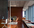 Preview of Zillow Executive Offices - Image 3: Chair, Furniture, Blackboard, Hardwood, Wood, Indoors, Interior Design, Dining Table, Table, Dining Room, Room, wood wall , wood floor, viroc, water feature, bench, lighting.