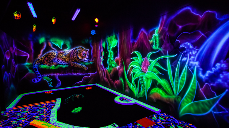 Rainforest Black Light Golf banner