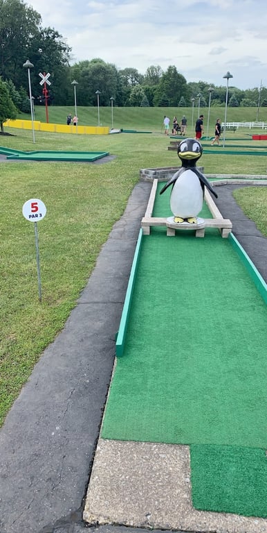 Rolling Greens Miniature Golf banner