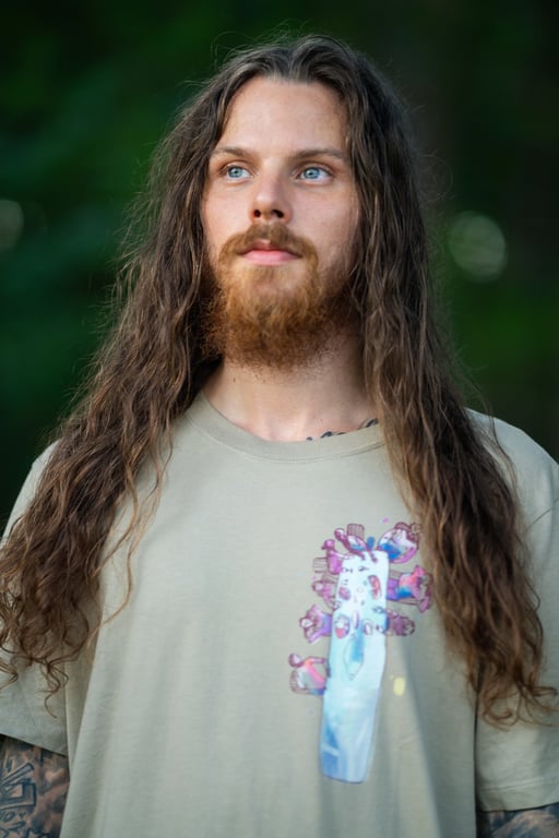 Elijah Pantam certified handpan instructor and sound healer in meditation pose
