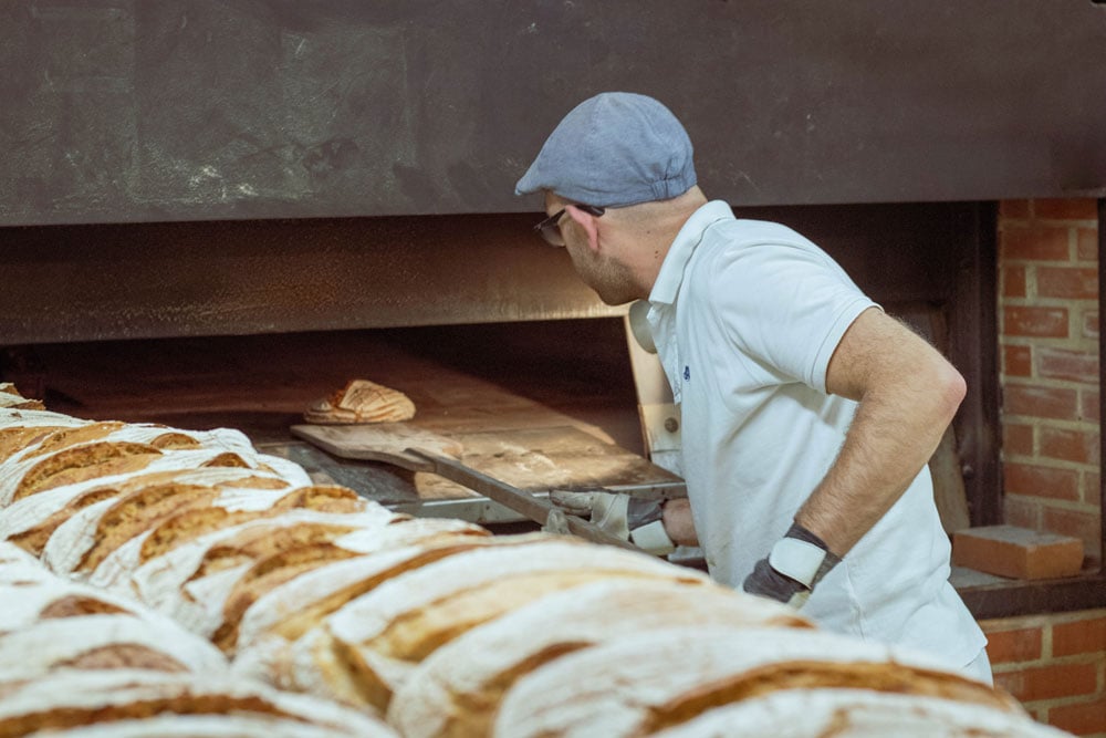Baker making bread