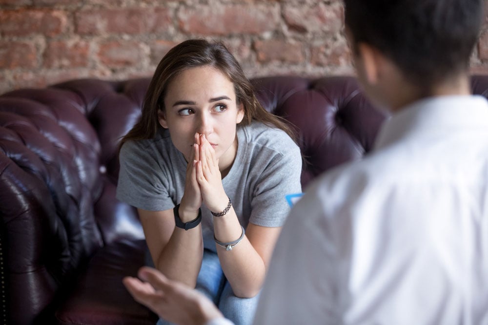 Young woman thinking