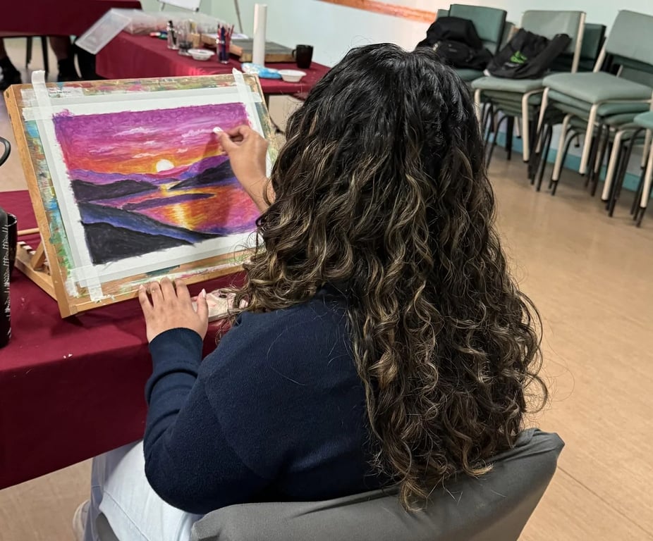 Student creating artwork