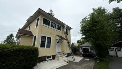 Lavender Stucco Home Exterior, Greenfield MA before - exterior painting Springfield MA
