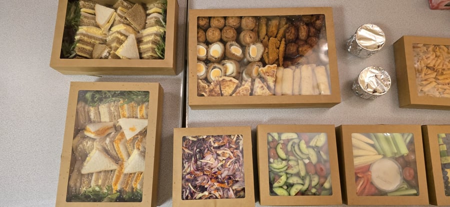 A selection of individually packaged sandwiches, snacks, and salads, ideal for welfare or crew catering