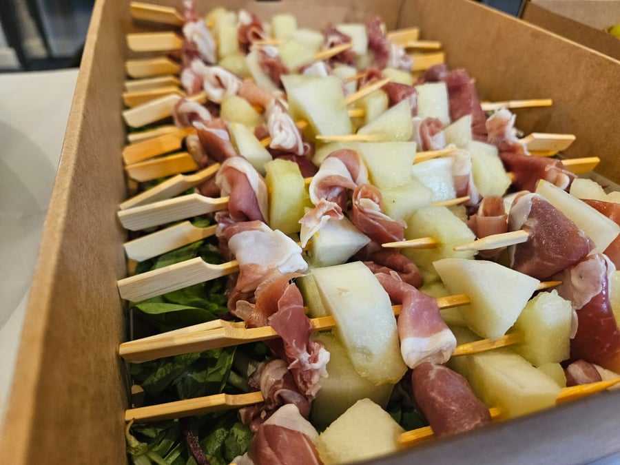 Delicious melon and prosciutto skewers, perfect for a light and refreshing starter or canapé at any event