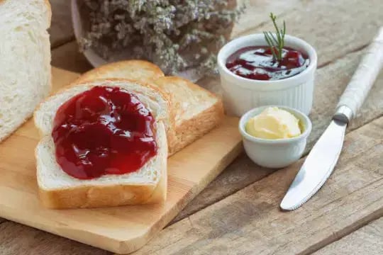 Butter & Jam Portion with Knife by Salt Wind Catering — image 2