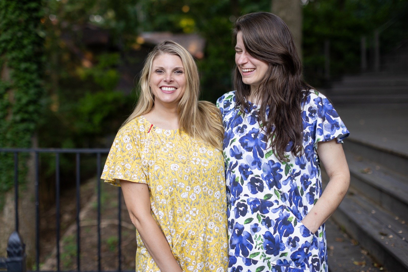 Founders of untethered posing in yellow and blue patient gowns