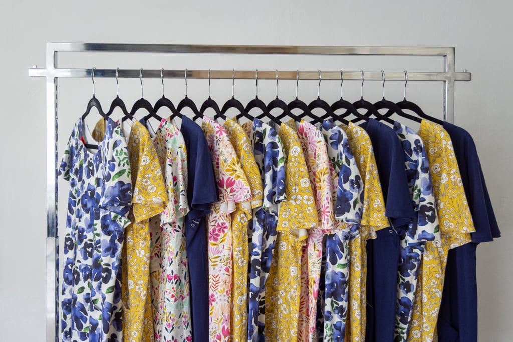 a beautiful rack of custom night gowns with floral designs on lightweight cotton spandex material