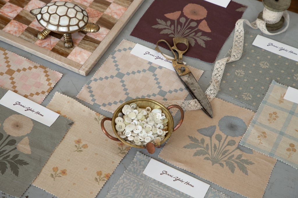 a creative photo of fabric squares that features designs from Jenni yolo's keepsake collection on little cocalico