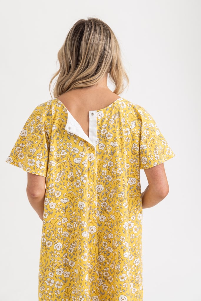 view of the back of a golden wildflowers hospital gown from untethered showing how the snaps work.