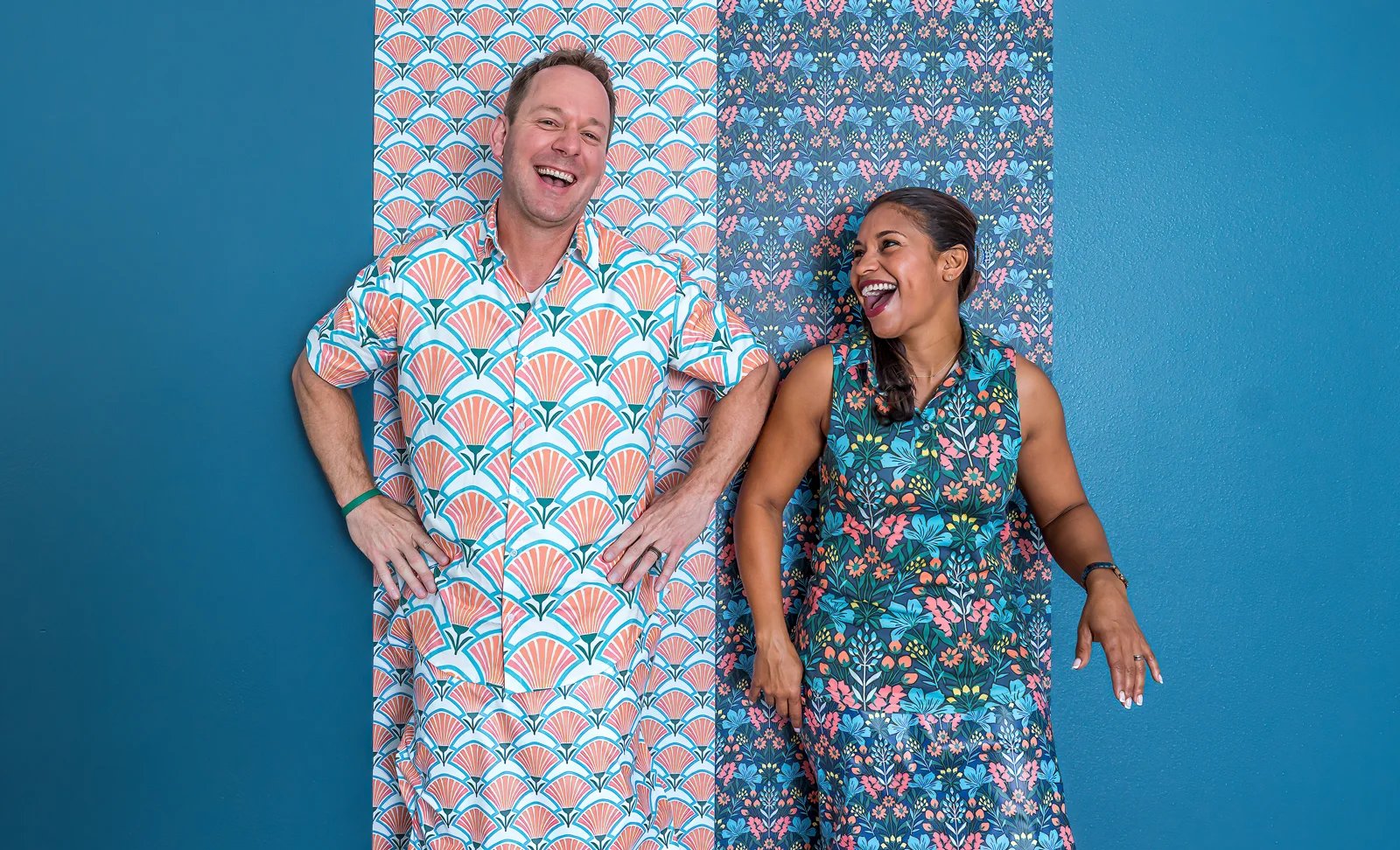 Brian and mika wearing custom clothes that match their wallpaper designs
