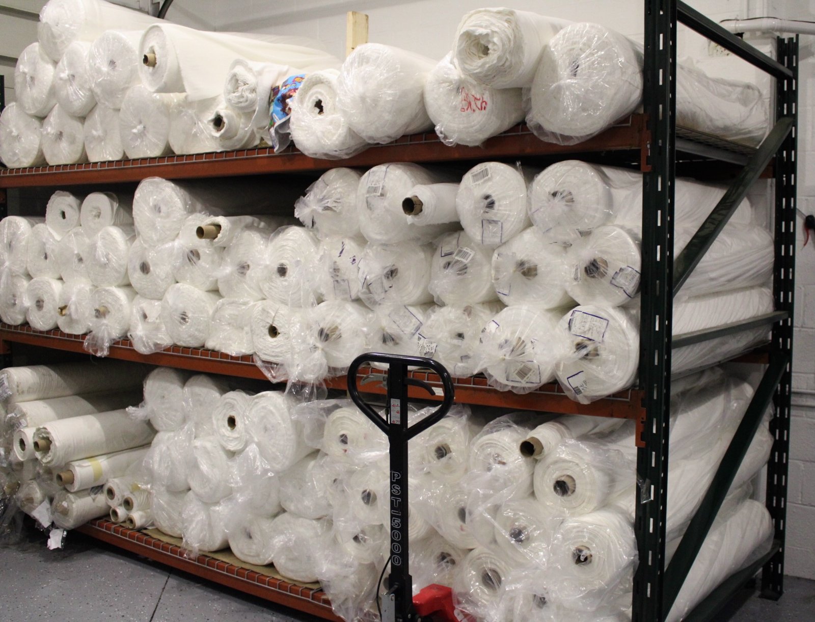 Rolls of fabric ready for printing