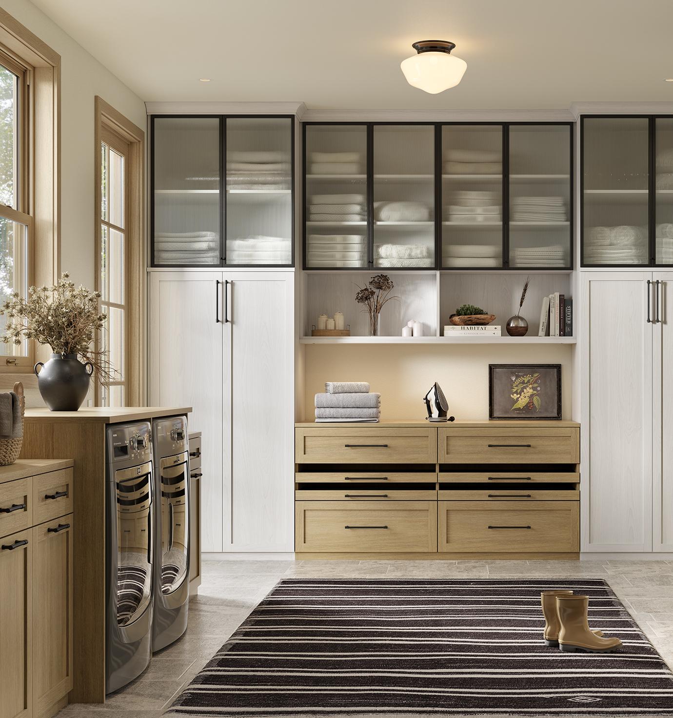 Organized mudroom with built-in laundry area, and storage shelves, by California Closets