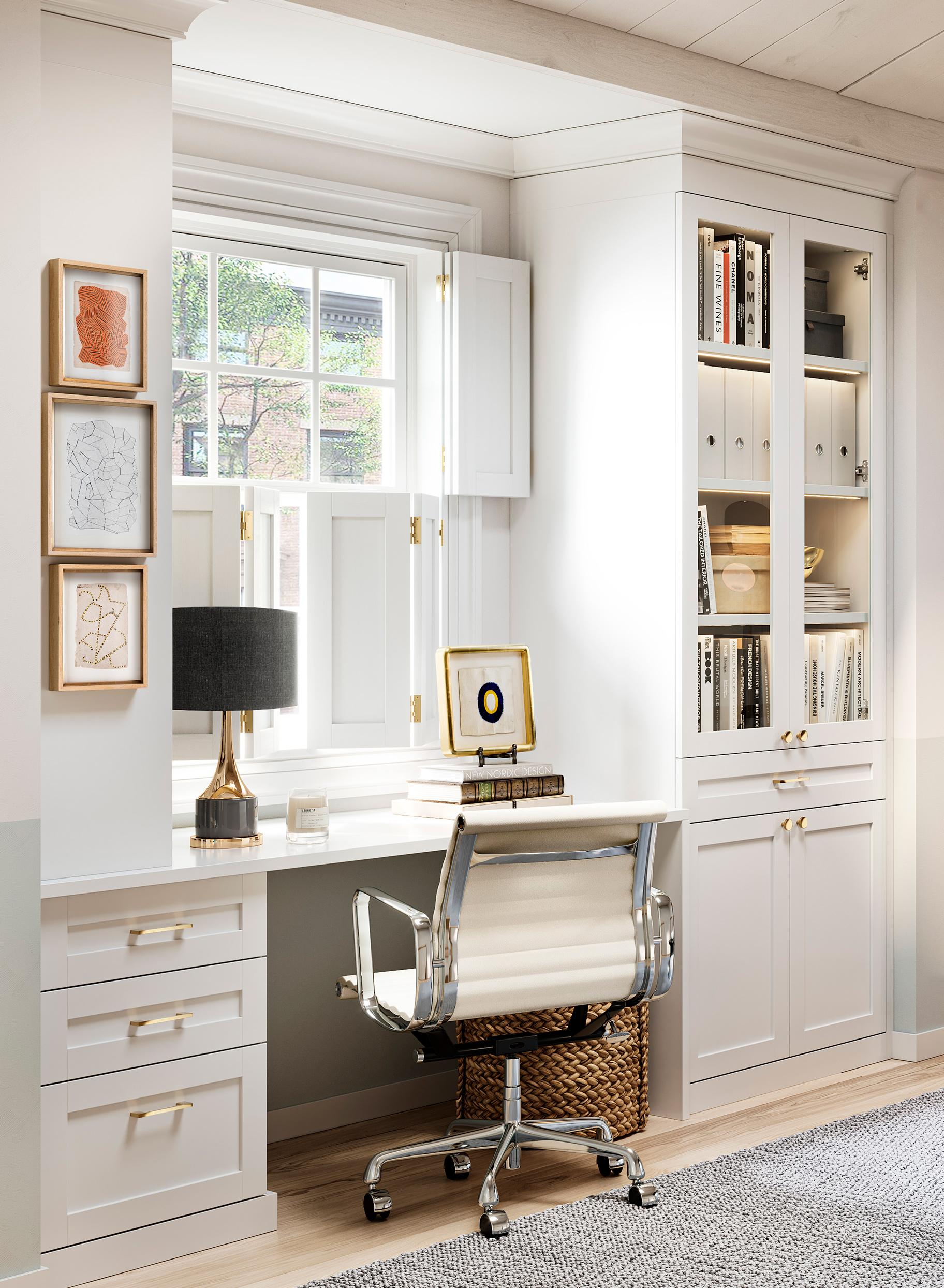 Attic room converted in to home office space and library shelving by California Closets