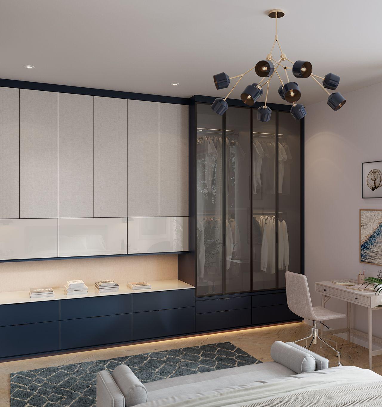 Closet with designed glass closet doors and drawers by California Closets