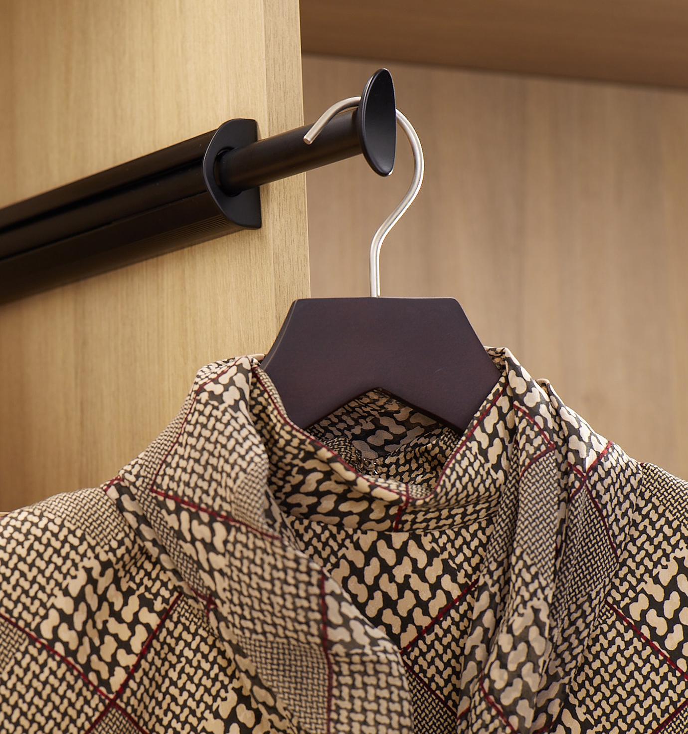 Personalized closet accessories with valet rack for hanging clothes by California Closets