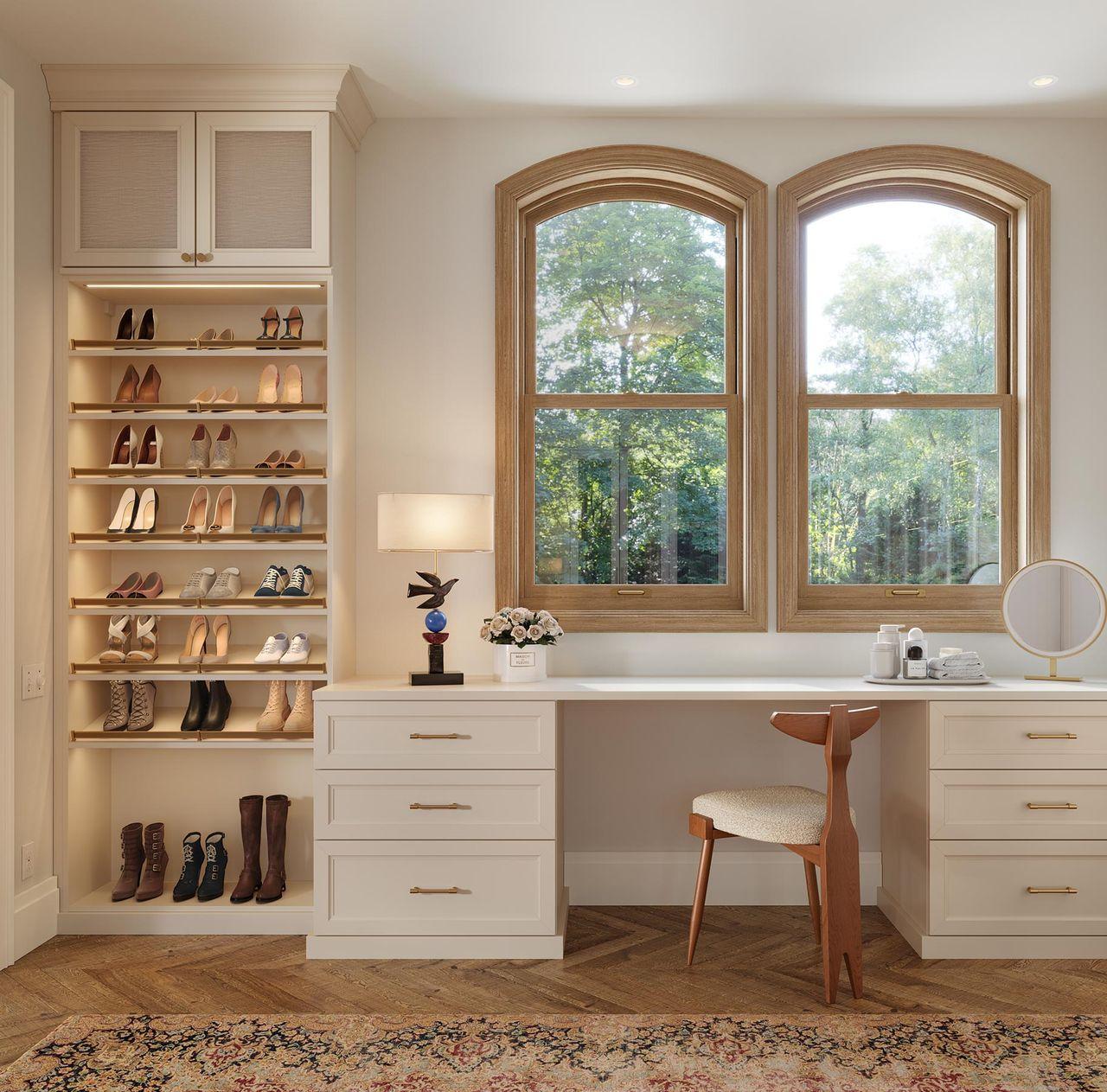 Dressing room space with office workstation desk and shoe storage shelving by California Closets