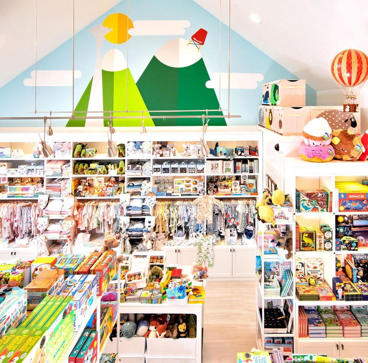 Toy store floor design with custom display shelves and cubbies by California Closets