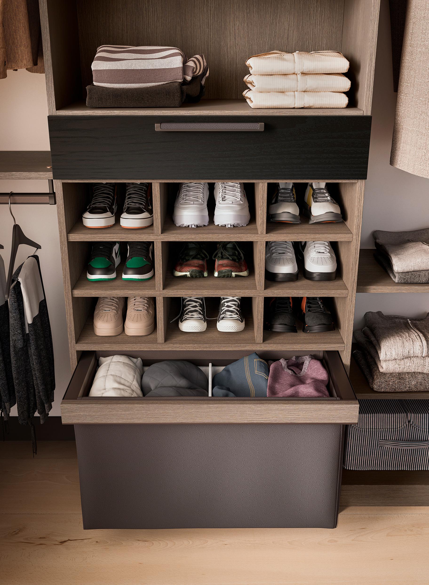 Reach in closet design with custom shoe storage and clothes hamper in dark wood finish created by California Closet