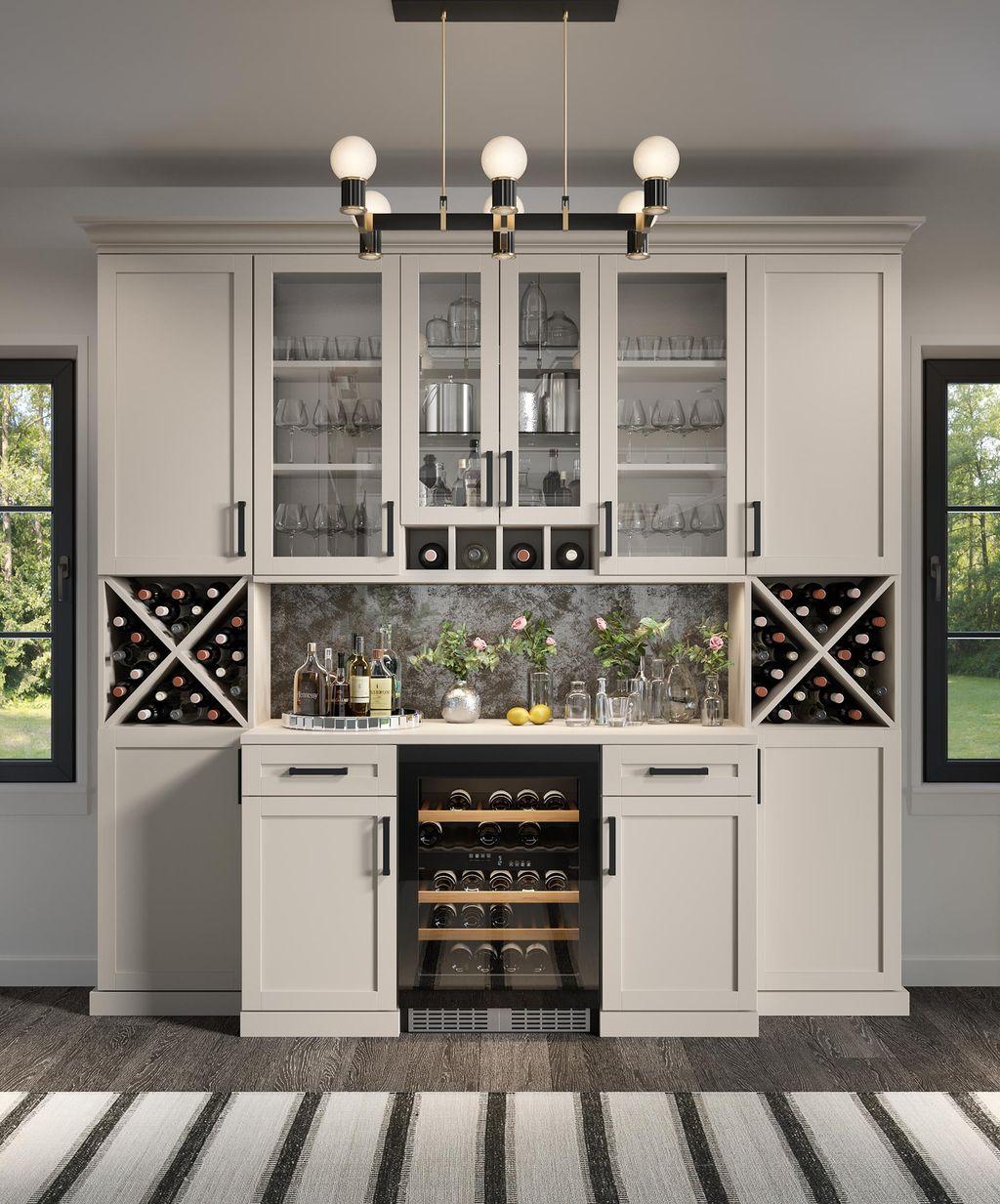 Pantry with custom wine storage cubbies and prep counter from California Closets