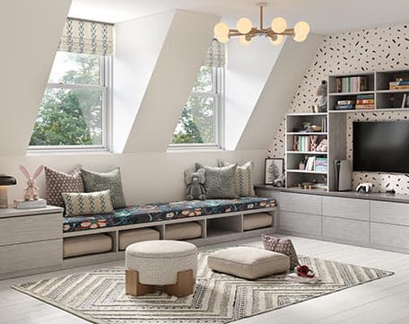 Playroom media center design with cabinets, shelving, bench seating in a light finish by California Closets