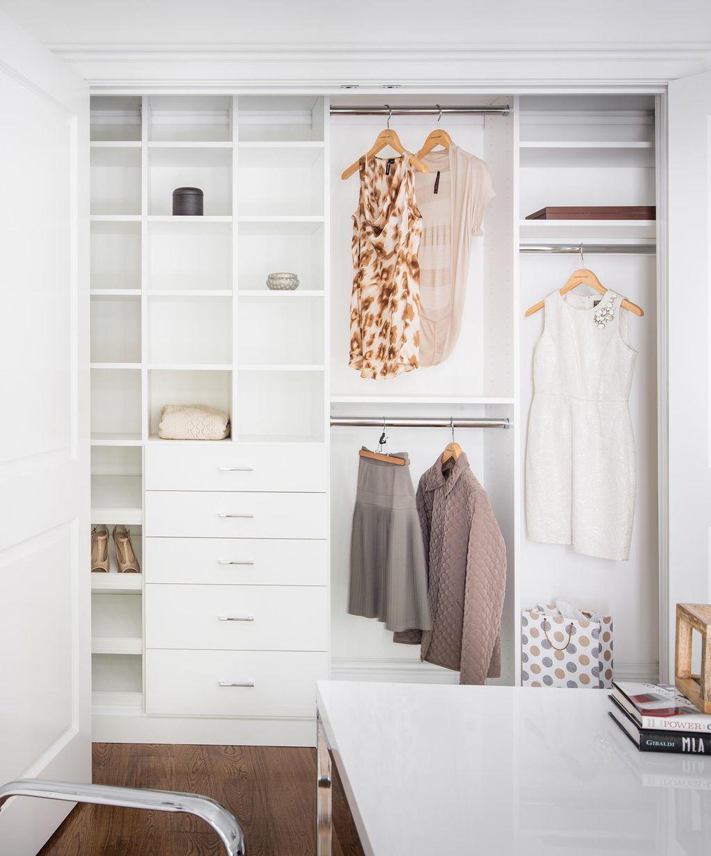 Classic white reach in closet system designed by California Closets.